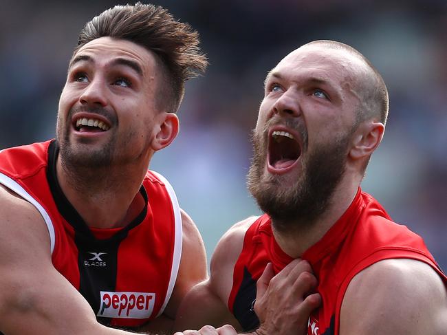 AFL Round 21. Melbourne v St Kilda at the MCG. Melbourne's Max Gawn and St Kilda's Billy Longer boundary throw in   . Pic: Michael Klein