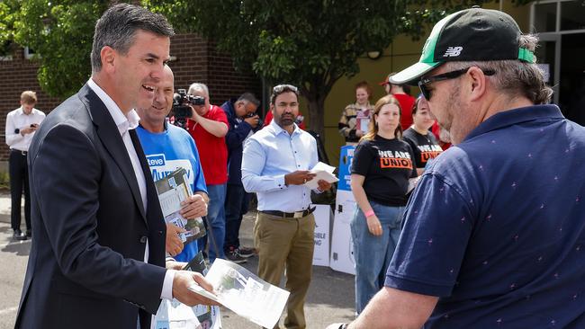 Werribee by Election. A voter declines a Liberal how to vote pamphlet from state opposition leader Brad Battin. Picture: Ian Currie