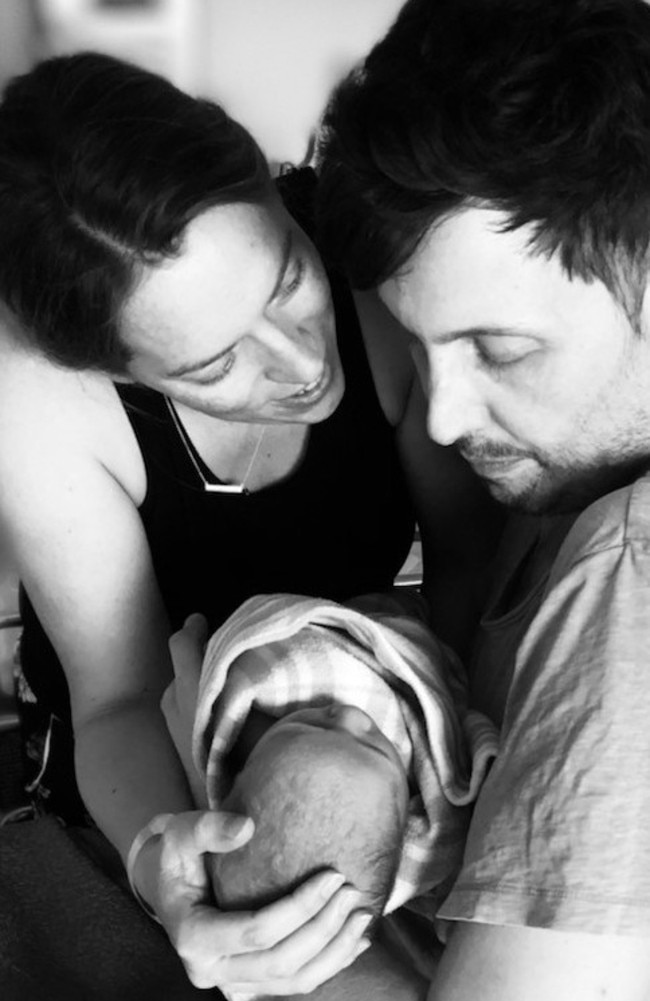 Julian Jefferis, with wife Allison, meeting his baby, Percival (Percy) before he passed away from pancreatic cancer. Picture: Supplied