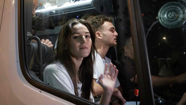 Released Israeli hostages siblings Maya and Itay Regev arrive to their family home in the city of Herzliya. Picture: AFP