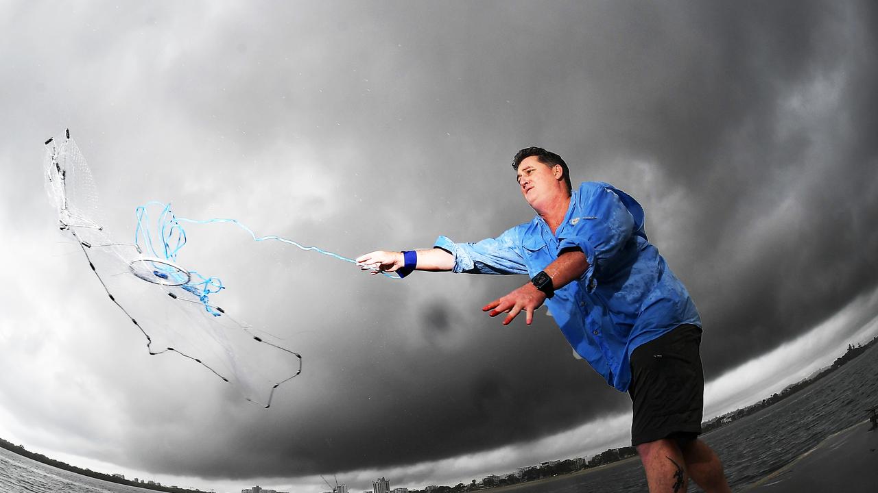 Peter Dwyer throws a cast net in the Maroochy River. Thunderstorms are on the cards for the Sunshine Coast later this week. Picture Patrick Woods