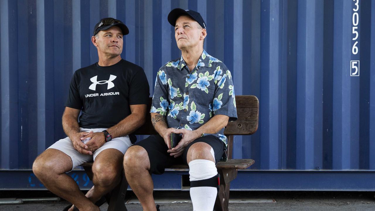 Shark attack survivor Rick Bettua (on right) with diving buddy Peter Kocica who helped save his life after being bitten savagely by a bull shark off Hinchinbrook Island. Picture: Lachie Millard