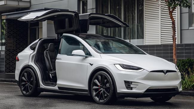 Head-turning “Falcon Wing” doors are featured on the Model X.