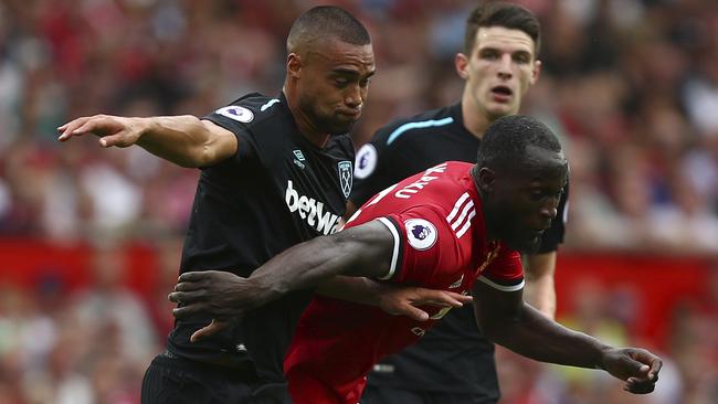 West Ham United's Winston Reid and Manchester United's Romelu Lukaku.