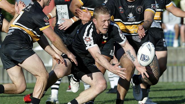 Redfern's Jay Belgrove lets the ball slip. Picture: John Appleyard