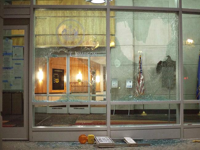 The windows of the Tommy G. Thompson Centre in Madison, Wisconsin, are shattered during demonstrations. Picture: AP