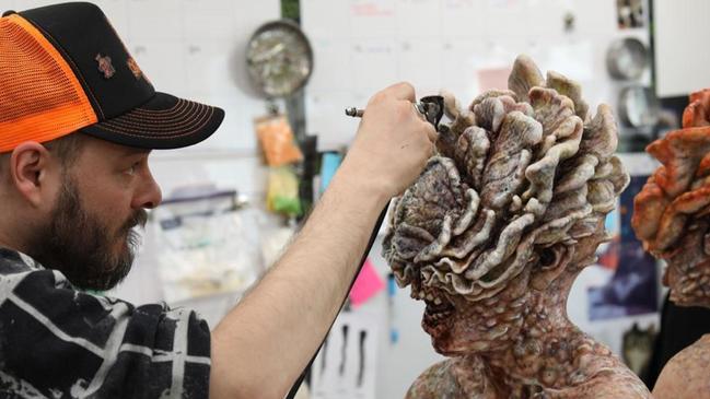 Joel Hall, an artist for HBO’s ‘The Last of Us,’ working on a mushroom-inspired piece. PHOTO: HBO