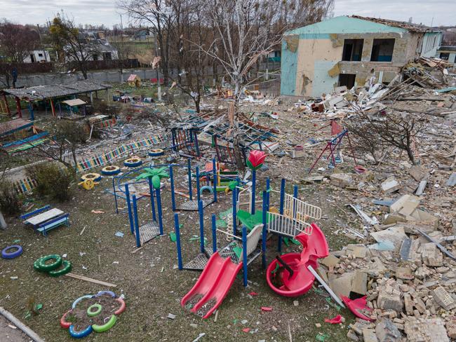 A damaged playground next to the Barvinok kindergarten building that was bombed during the Russian invasion west of Kyiv in Makariv, Ukraine. Picture: Getty Images