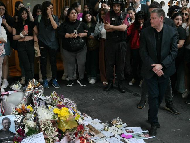 Geoff visits the fan tributes for the late former One Direction member outside Casa Sur Hotel. Picture: JUAN MABROMATA/AFP