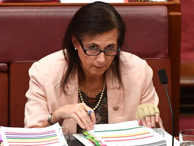 International Development Minister Concetta Fierravanti-Wells had to clarify her comments on the tax debate during Question Time after receiving incorrect information. Mick Tsikas / AAP