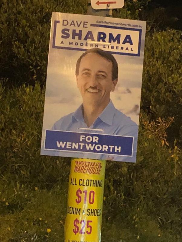 A defaced campaign poster of Wentworth Liberal candidate Dave Sharma.