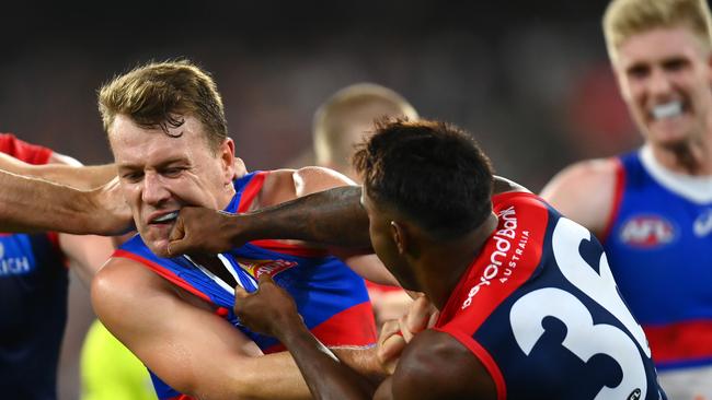 Jackson Macrae and Kysaiah Pickett jumper punch after his bump on Bailey Smith. Picture: Quinn Rooney/Getty Images