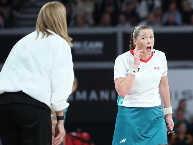 MELBOURNE, AUSTRALIA - MARCH 26: A referee and Nicole Richardson, Coach of the Magpies appear to disagree on a decision during the round two Super Netball match between Collingwood Magpies and Melbourne Vixens at John Cain Arena, on March 26, 2023, in Melbourne, Australia. (Photo by Kelly Defina/Getty Images)