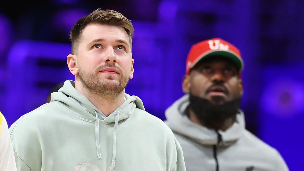 Luka looking on as a member of LeBron James’ Lakers. Harry How/Getty Images/AFP