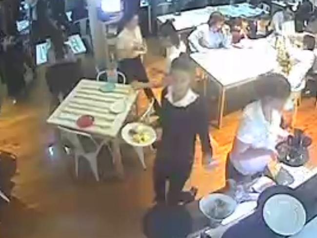 Still images from CCTV at Coast Bar &amp; Restaurant showing work experience girls serving alcohol to patrons. Picture: supplied