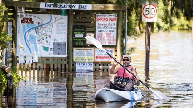 Pete Stripe kayaking along the foreshore at Swan Reach. Picture: Tom Huntley