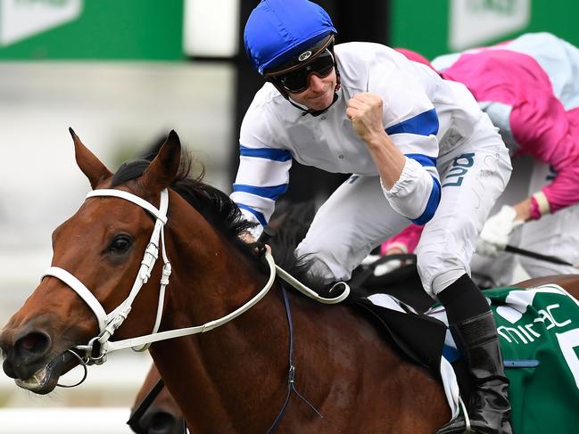 Jockey James McDonald rides Kolding to victory in race 5, the Queensland Guineas, during Stradbroke Day at Eagle Farm Racecourse in Brisbane, Saturday, June 8, 2019. (AAP Image/Albert Perez) NO ARCHIVING, EDITORIAL USE ONLY