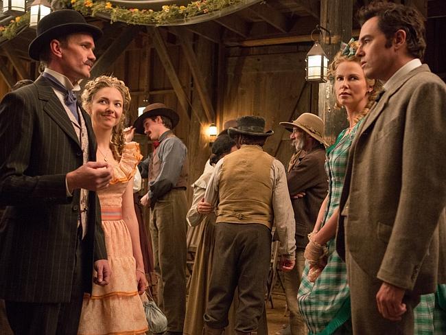 Neil Patrick Harris, Amanda Seyfried, Charlize Theron and Seth MacFarlane in a scene from the film. 