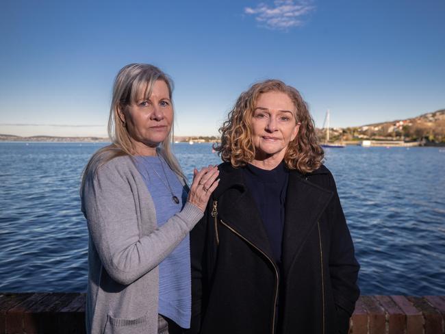 Madonna Paul (right), whose husband Michael died by suicide after a 10-year career with the Royal Australian Air Force. She was supported at the Royal Commission for Defence and Veteran Suicide in Hobart by Julie-Ann Finney who started the petition for the royal commission to take place. Picture: ABC News, Luke Bowden.