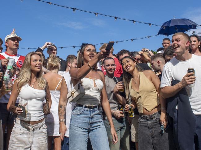 Aussies have flocked to pubs to play two-up on Anzaac Day. Picture: NewsWire / Simon Bullard.