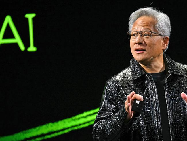 Nvidia CEO Jensen Huang delivers a keynote address at the Consumer Electronics Show (CES) in Las Vegas, Nevada on January 6, 2025. Gadgets, robots and vehicles imbued with artificial intelligence will once again vie for attention at the Consumer Electronics Show, as vendors behind the scenes will seek ways to deal with tariffs threatened by US President-elect Donald Trump. The annual Consumer Electronics Show (CES) opens formally in Las Vegas on January 7, 2025, but preceding days are packed with product announcements. (Photo by Patrick T. Fallon / AFP)