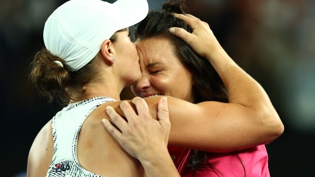 Barty hugging close friend and former doubles partner Casey Dellacqua moments after she won. Picture: Clive Brunskill/Getty Images