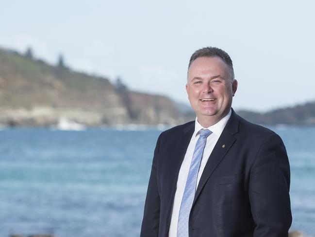 EXPRESS ADVOCATE/AAP. Member for Terrigal Adam Crouch poses for a photograph at Avoca Beach on Tuesday, 17 December, 2019. Adam Crouch has been appointed Parliamentary Secretary for the Central Coast **EMBARGOED UNTIL MIDNIGHT, WEDNESDAY 18 DECEMBER, 2019** . (AAP IMAGE / Troy Snook)