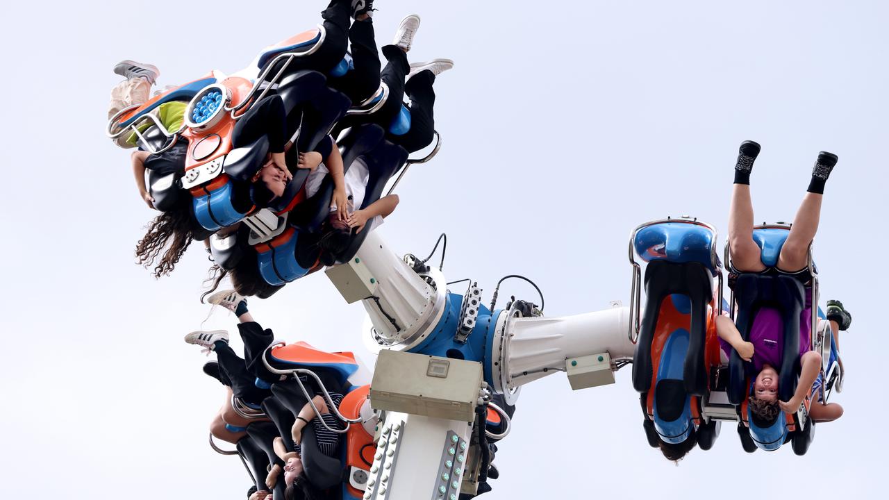 Show attendees on the Extreme Speed Two rollercoaster on Good Friday. Picture: NCA NewsWire / Damian Shaw