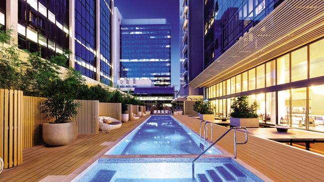 The pool is too irresistible to ignore at the Skye Suites hotel at Parramatta. Picture: Mauro Risch