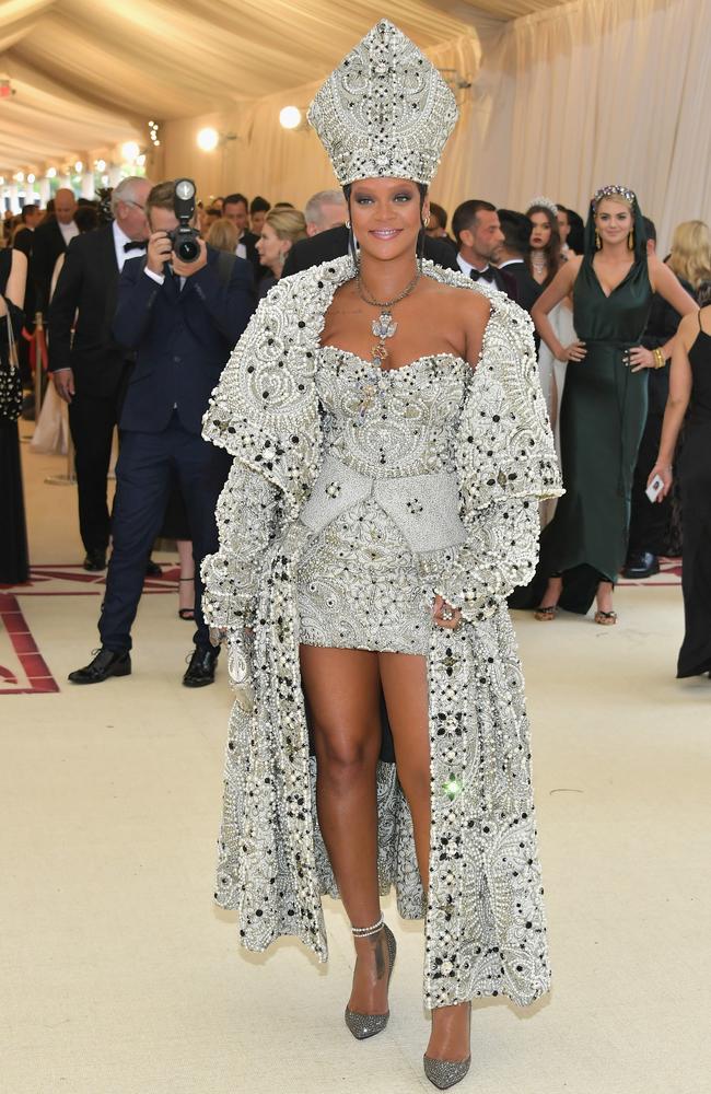 Her dress is a bit shorter than the Pope’s, but otherwise... it’s uncanny. (Photo by Neilson Barnard/Getty Images)