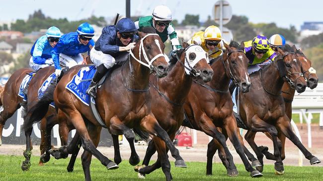 Switzerland surges to the front in the Coolmore Stud Stakes. Photo: Pat Scala/Getty Images.