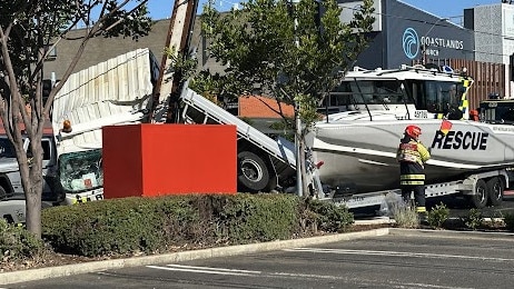 A serious crash on Brighton road involving a truck with a rescue boat attached to the back.