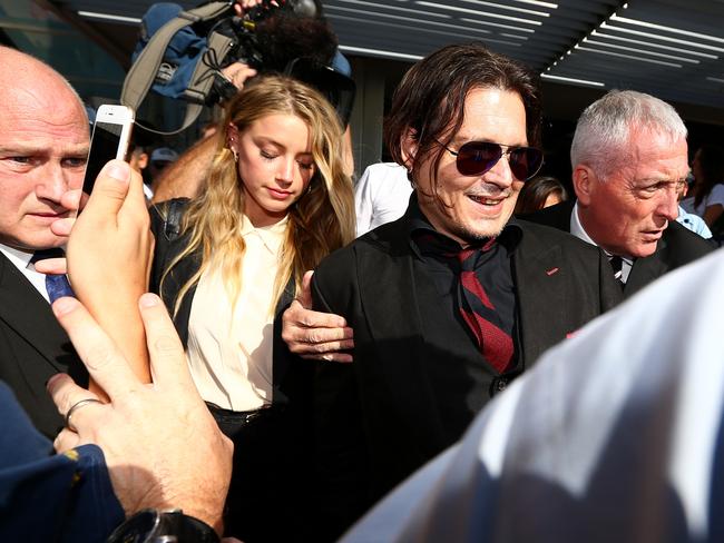 Johnny Depp and his wife Amber Heard appear during a court appearance in Queensland. Picture: Adam Head