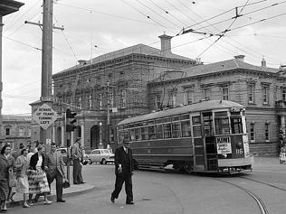 The No.116 tram passes the Town Hall in the 1950s ...