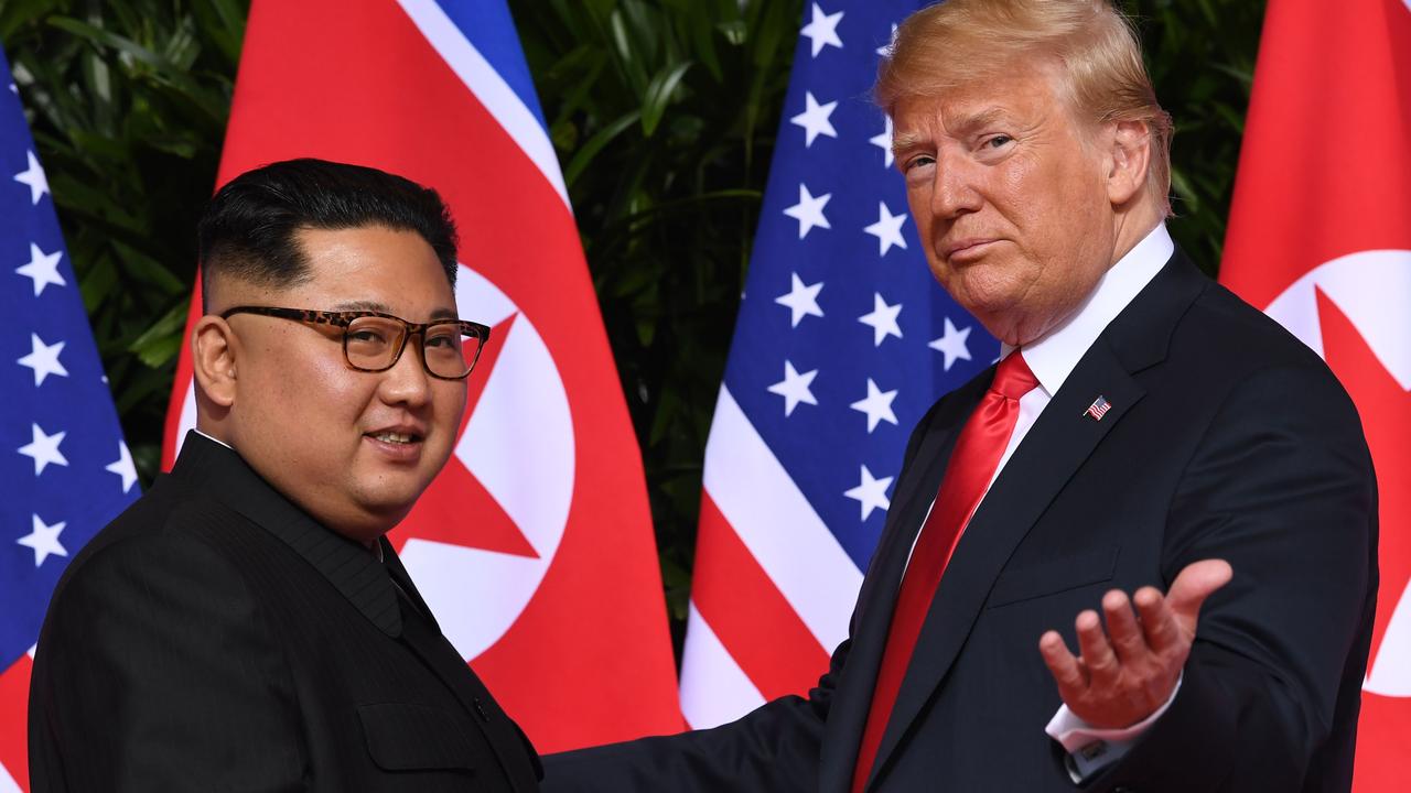 Kim with US President Donald Trump (right) at the start of their historic US-North Korea summit in 2018. Picture: Saul Loeb/AFP