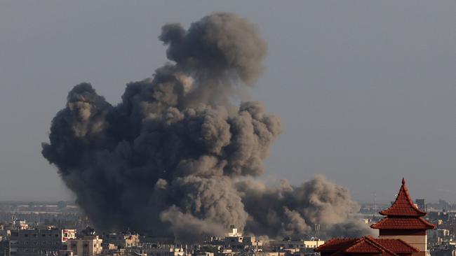 A picture taken from Rafah shows smoke billowing over Khan Younis. Picture: AFP