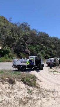 Campfire sparks blaze in Teewah sand dunes