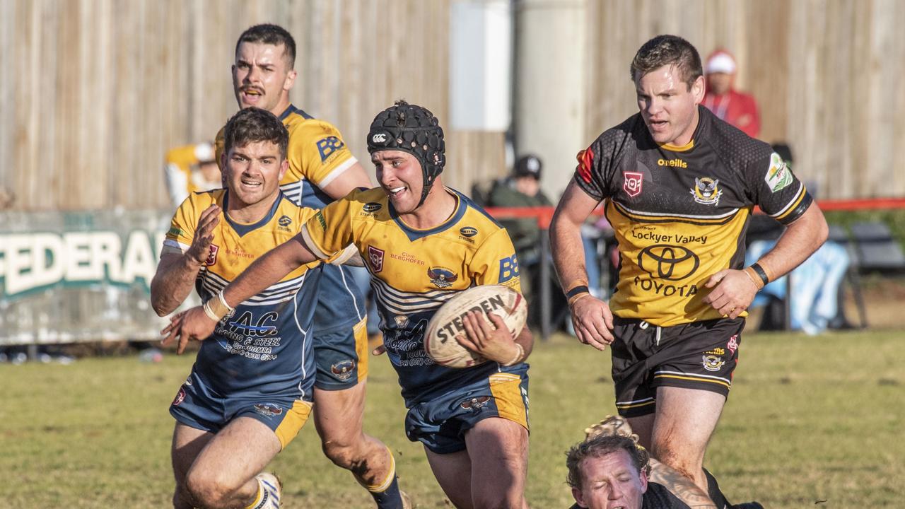 Thomas Hatch for Highfields and Shannon Hicks for Gatton. Gatton vs Highfields. TRL Madsen Rasmussen Hutchinson Builders A Grade 2022. Sunday, July 3, 2022. Picture: Nev Madsen.