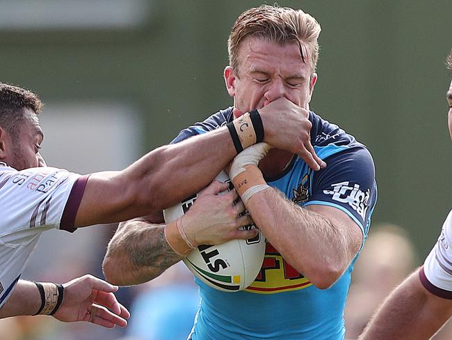 A blow for Titans half Kane Elgey. Picture: Jono Searle/Getty Images