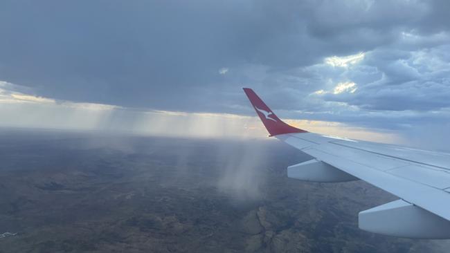 Rain over Central Australia on the Alice Springs to Darwin flight, February 2025. Picture: Gera Kazakov