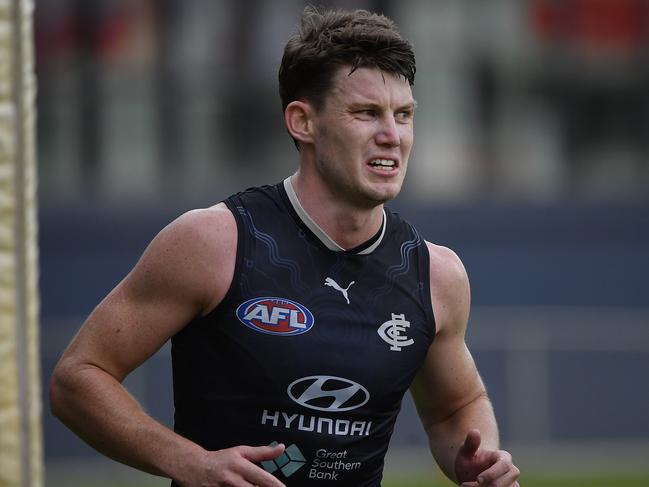 Sam Walsh runs the boundary on Saturday. Picture: Andrew Batsch