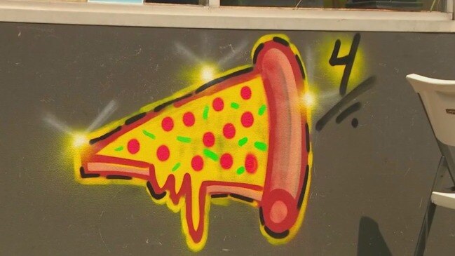 Mystery graffiti artist painting pizzas in Westchester | NT News