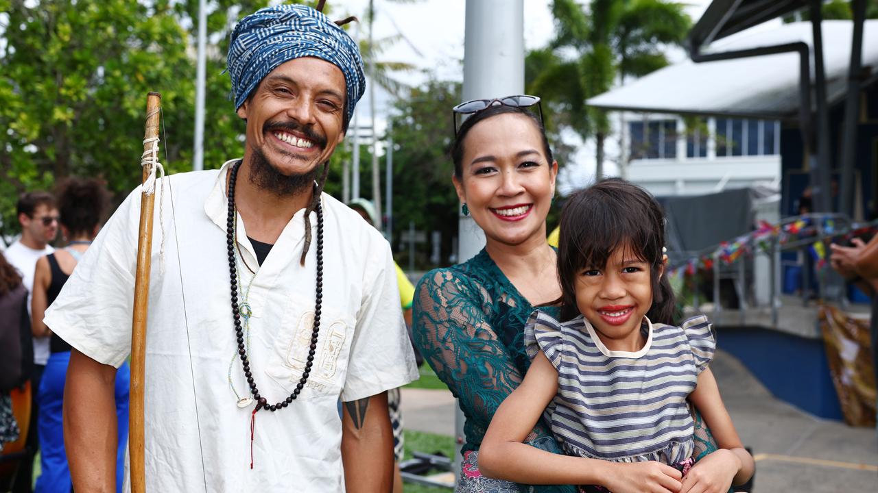 Juvarn Thebus, Ina Indriana and Elfa Santoso, 6, at the 19th annual CARMA multicultural festival, held at Fogarty Park. Picture: Brendan Radke