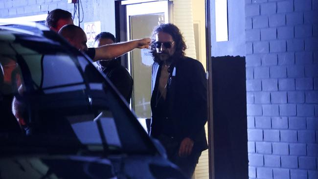 British comedian and actor Russell Brand walks outside the Wembley Park Theatre, in northwest London on September 16. Picture: Reuters