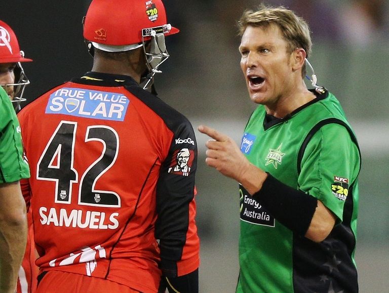 A cosmetically enhanced Shane Warne explodes during a conflict with West Indies batsman Marlon Samuels in a charged Big Bash League Twenty20 game between the Melbourne Stars and Renegades last Sunday. Picture: Michael Dodge / Getty Images