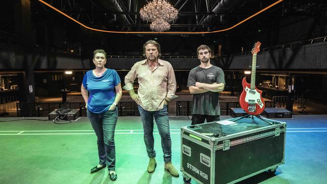 John Collins (centre) with music industry workers Shannon Ward and Jordan Jackson at The Fortitude Music Hall in Brisbane, February 2021. Picture: Glenn Hunt