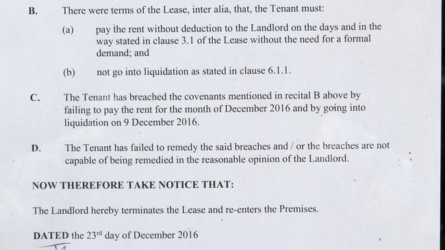 A section of another notice in the window, which says the tenants failed to pay rent and went into liquidation. Picture: Mark Wilson