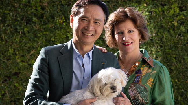 Li Cunxin and wife Mary Li at home this month with dog Nala. Picture: David Kelly