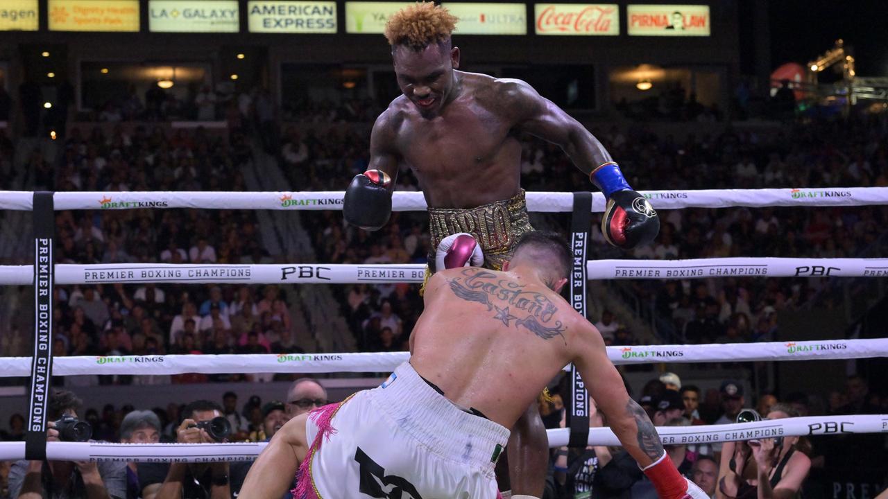 Jermell Charlo (L) knocks down Brian Castano (R) during their super middleweight title fight at Dignity Health Sports Park on May 14, 2022 in Carson, California. Photo: Getty Images