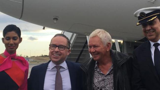 Qantas CEO, Alan Joyce, second from left, unveils the new Dreamliner.